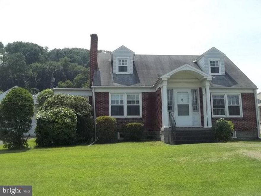 3 bedroom, 1.5 bath with fireplace in living room; 1 bedroom and half bath on first floor; 4 car garage; nice yard.