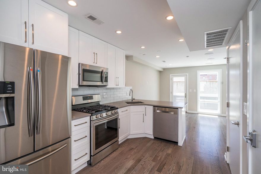 This stunning newer construction building in Graduate Hospital offers luxurious space at a great value. Enter your brand-new home and immediately notice the great natural light from the large windows. Step across the fine hardwood flooring to your modern kitchen, featuring stainless Samsung appliances, quartz counter tops with bar seating, and ample cabinet space. NEST Thermostats, hard-wired speakers in the ceiling and outdoor spaces, and Video Intercom to the front entrance are just some of the many features of this condo. This unit has a private deck, which is the perfect spot to enjoy a cup of coffee in the morning. Prime Location! This property provides easy access to restaurants, shopping, schools, public transportation and much more. Easily walk to the Center City, the Broad Street Subway, Rittenhouse Square, and the Schuykyll River Trail. Great access to Penn, Drexel, and CHOP. Close to I-76 and I-95 for an easy commute out of the city. Located in the Greenfield Catchment. Don't miss a great opportunity to live in this one of a kind building.