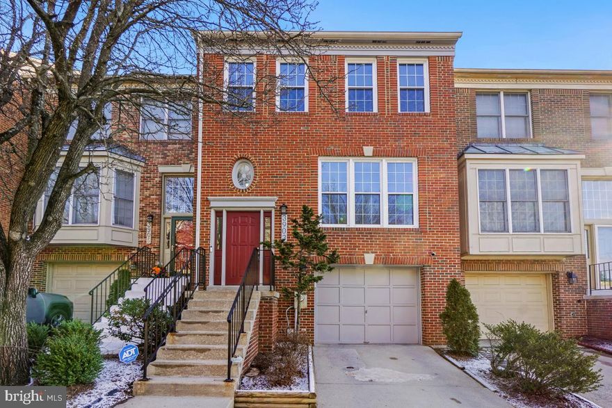 Beautiful brick garage townhome that is move-in ready with a lot of remodeling.  Hardwood floors.  Gourmet kitchen with granite counters, lovely grey cabinets and stainless-steel appliances and a full breakfast area plus a built-in granite island.  Primary bedroom with cathedral ceilings and full remodeled primary bath with upgraded tile and with a separate free-standing tub and double vanity.  Primary closet has built-ins that are to die for!  Entertainment level with dining area and living room area.  Living room with large window allowing lots of light.  Fully finished walk out basement with Rec Room and fireplace.  Walk out to your back yard and enjoy the deck and pergola.  Fantastic lot in this community with extra parking on the side.  Incredible commuter location that is close to Route 29 and tons of shopping.