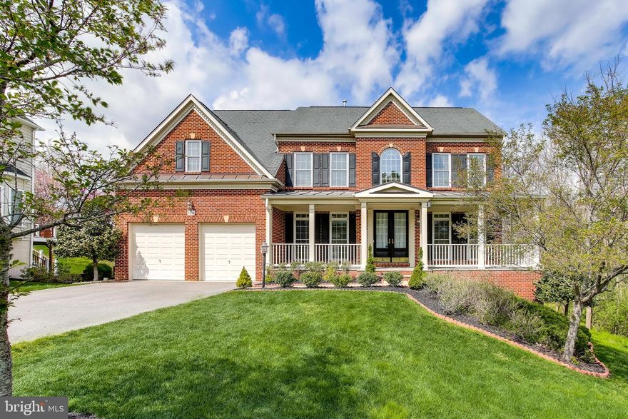 Welcome HOME to this custom built Winchester home with over 6,000 sqft of LUXURY. Complete with SPACIOUS Bedrooms & 4.5 Bathrooms, this home is truly a work of ART! The moment you walk up this amazing driveway you'll be greeted with two spacious patios and impressive 8 ft front doors. Step into a grand two-story foyer with a fresh coat of paint throughout the home, curved staircase, crown moulding & columns. Entertaining venues are endless beginning with stunning Living and Dining formals on the main level. The family room is outfitted with a fireplace and mantle flanked by designer windows gleaming with light. An adjacent solarium sets the stage for indoor to outdoor living and entertaining while the kitchen unfolds through a gracious Butlers service pantry into an exciting new kitchen. The gourmet kitchen is every cook's dream with seemingly infinite counter space and room for family dinners or staff the kitchen for special events. Don't miss out on the butler pantry as well as the hall to a private storage and laundry area. Make your way upstairs from either entry into the grand owner's suite which features a spacious private sitting area for you and your partner to enjoy time away from everyone else. Owner's ensuite bathroom features a large soaking tub, stand in shower, storage and of course his/hers walk-in closets. There are 3 spacious bedrooms with 2 full bathrooms upstairs. Downstairs, a fully finished lower level offers flexibility and lifestyle options galore. The staircase separates the gym from the main recreation area. Lifestyle flexibility is invaluable, and this property can fill every need with private living quarters, and a full bath. On the other side, flexible recreation spaces can accommodate media, gaming, entertaining, homeschooling, and exercise all at once! Private access to a walk out basement into gorgeous patio to enjoy the natural beauty of the forest conservation to the left of your home!   This home truly has it all! Contact Sunna Ahmad for a private showing this one will definitely not last!