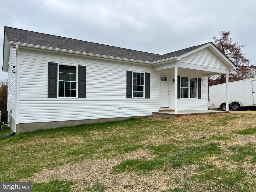 Discover an exquisite opportunity to own a brand-new residence in the Long View subdivision, where luxury meets tranquility. This stunning ranch-style home, completed in 2025, boasts a modern design and high-end finishes that cater to an exclusive lifestyle. The gourmet kitchen is equipped with stainless steel appliances, including a built-in microwave, electric oven/range, and a spacious refrigerator, complemented by a convenient pantry for all your culinary needs. Recessed lighting throughout enhances the ambiance, while ceiling fans provide comfort in every season. This thoughtfully designed home features three well-appointed bedrooms, including an entry-level primary suite that offers privacy and convenience. The two full bathrooms are elegantly finished, showcasing modern fixtures and finishes that elevate your daily routine. The property sits on a generous 0.47-acre lot, offering ample outdoor space for relaxation and recreation. The cleared front and rear yards provide a blank canvas for landscaping or outdoor entertaining, while the proximity to the Wicomico River allows for water-oriented activities and serene views. Enjoy the luxury of water access, perfect for kayaking or simply soaking in the natural beauty of your surroundings. Additional highlights include a main floor laundry area with hookups, ensuring ease of living, and a driveway that accommodates up to three vehicles, providing convenience for you and your guests. Experience the ultimate in luxury living with access to community amenities, including a private beach, where you can unwind and enjoy the picturesque waterfront lifestyle. This exceptional property is not just a home; it's a gateway to a serene way of life. Don't miss your chance to make this dream residence your own.
Conditioned crawl space
40-year shingles