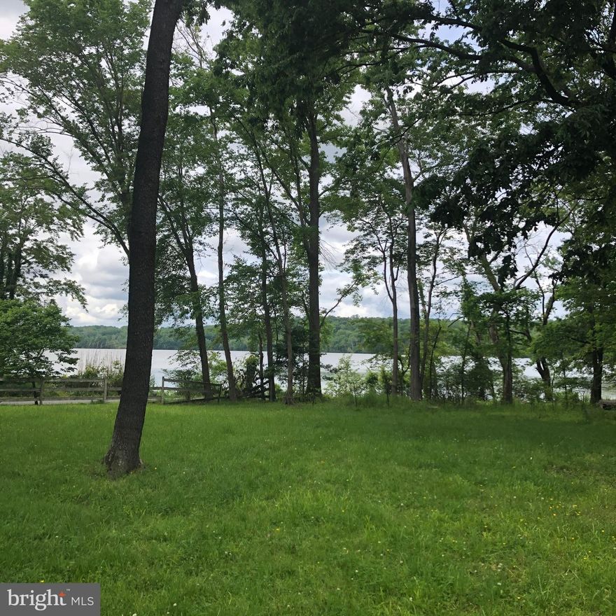 Peaceful, vacant lot for sale.  Beautiful view of Piscataway Creek across street from lot.  Calvert Manor Park walking distance from lot.  Pavilion, picnic area, tennis court and play equipment for children.  Buyer to do own due diligence on all aspects of the  property.  Do not enter shed on property.  Lot is being sold as-isHighest and best offer to be submitted to listing agent before 5:00 pm 6/10/2020.