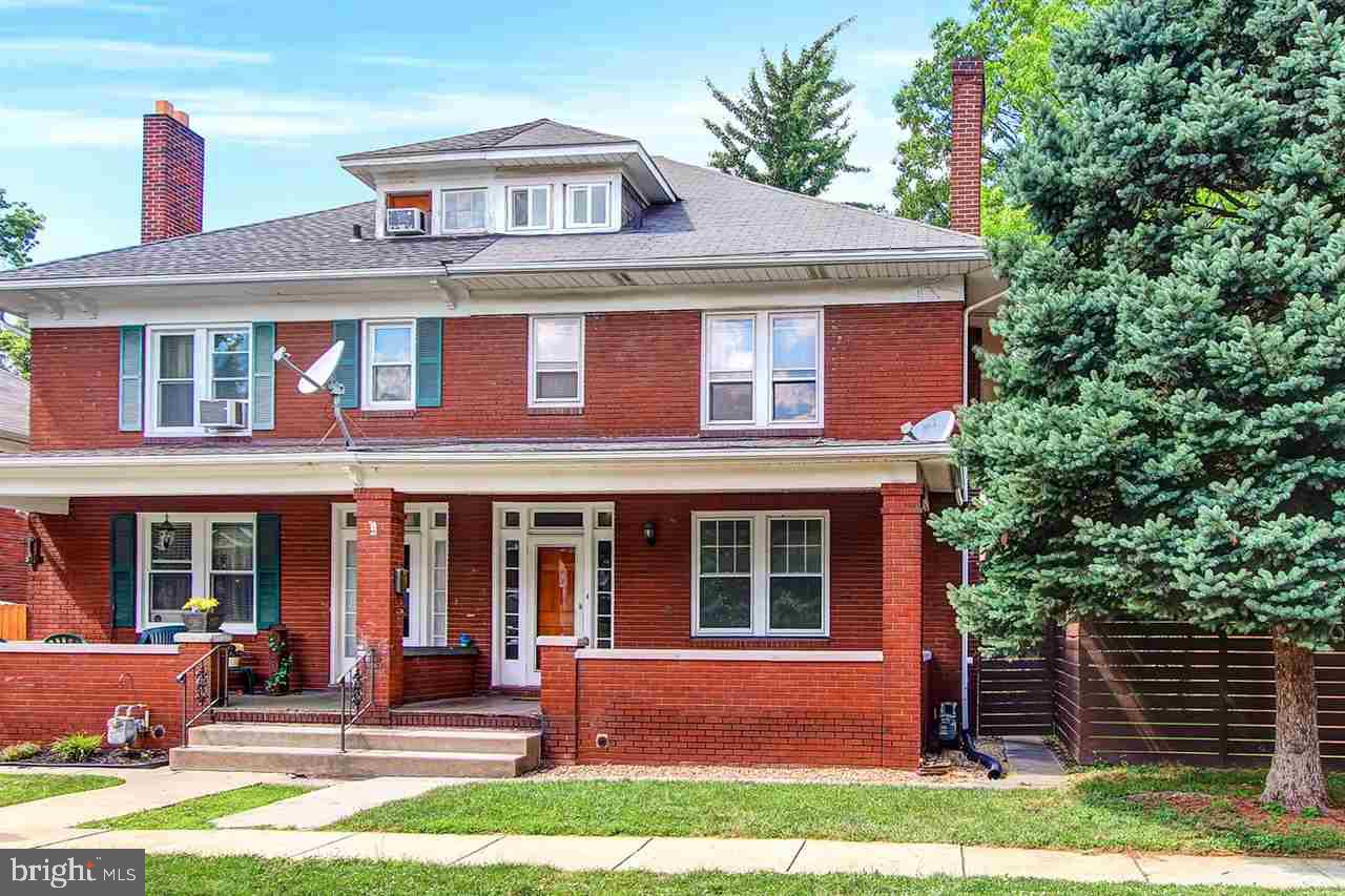 3 bedroom semi in the popular neighborhood of Elmwood. Hardwood floors, built-ins in dining room, fireplace in living room. Fenced rear yard. Detached 1 car garage. Walk up attic would be perfect for office or fourth bedroom. Outside entrance in basement. Covered front porch. Rear balcony. Gas heat. All brick.