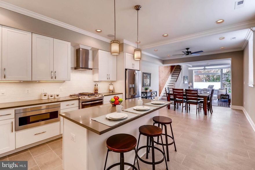 Introducing Building Character's Latest End-of-Group CHAP Certified Renovation with a Garage. 4 Levels, 4 Above Grade Bedrooms plus a Finished Lower Level. 4 Full Baths. Roof-top Deck with Wet Bar. Main Level Powder Room. Dining Room. Walk-in Closets. Linen Closets. Over 3,100 Sq Ft of Finished Space. 2-Year Builder Service Warranty. The Builder is available for tours.