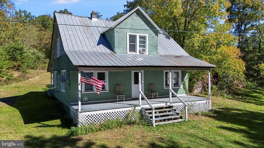 **Homeplace in the Hollow – Your Dream Farmstead Awaits in Delray, WV!**Escape to the country with this charming, well-maintained 1950’s farmhouse, nestled on 15+ unrestricted acres in the heart of Delray. This picturesque property is perfect for those looking to create their own homestead, offering ample space for gardens, chickens, goats, and more. The varying topography lends itself to multiple uses, from farming to outdoor recreation, with a peaceful creek running through to enhance the serenity of this hollow hideaway.  The 4-bedroom, 1-bath, 2-story farmhouse is in good condition, awaiting your personal touch to breathe new life into it.  Whether you're looking for a weekend retreat, RENTAL INVESTMENT,  or a full-time home, this property provides the perfect backdrop for a country lifestyle.  Additional features include two outbuildings, ideal for storage or a workshop, and a fenced pond—great for animals or simply enjoying the natural beauty around you. With no restrictions, you have the freedom to live your country dream however you see fit!   Located conveniently off Route 29 and accessed via a county-maintained road, this home is a short drive from Romney, WV, Moorefield, WV, and Winchester, VA, offering the best of rural living with easy access to nearby towns.  Property Sold As-Is.