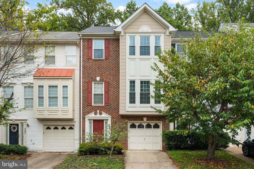 *** OFFER DEADLINE SUNDAY, SEP 22 @ 6PM - ALL BEST AND FINAL BY THIS TIME*** This three-level townhouse in the sought-after Fairfax Ridge community, complete with a one-car garage and driveway, offers spacious interiors, upgraded finishes, and a prime commuter location. Upon entering, you're greeted by a spacious foyer that leads to the lower-level family room. The neutral color palette and open-concept design flow throughout the upstairs main level, where the living, dining, and kitchen areas seamlessly connect. Large windows and a sliding glass door bathe the space in natural light, creating a bright and welcoming atmosphere. The eat-in kitchen features upgraded countertops and modern cabinetry. Upstairs, the primary bedroom includes an en-suite bath with a double vanity, soaking tub, and modern tiled shower. Two additional bedrooms and a full bath complete the upper level. The fully finished walk-out lower level offers a spacious rec room with a cozy gas fireplace and patio access, making it ideal for gatherings. Outside, the deck and concrete patio overlook a tree-lined backyard, providing a peaceful retreat. Conveniently located near shopping, dining, and entertainment, this home is perfect for modern living!