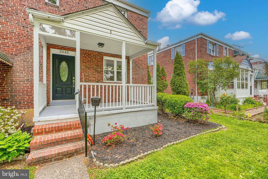 Beautifully renovated brick semi-detached home offering charm, space, and thoughtful updates throughout. The front porch provides a welcoming entry into a bright interior featuring refinished hardwood floors, fresh paint, recessed lighting, and an open feel throughout the main level. The renovated kitchen is designed for both everyday living and entertaining, complete with white cabinetry, a center island, quartz countertops, and new stainless steel appliances. Upstairs offers three generously sized bedrooms with hardwood floors and a beautifully renovated full bath. The fully finished lower level adds valuable living space with new carpet and a second full bathroom, ideal for a family room, guest space, or home office. Out back, enjoy a charming three-season room perfect for summer crab feasts, along with a fenced backyard and one-car garage. The new HVAC adds peace of mind and efficiency. Schedule your showing today!