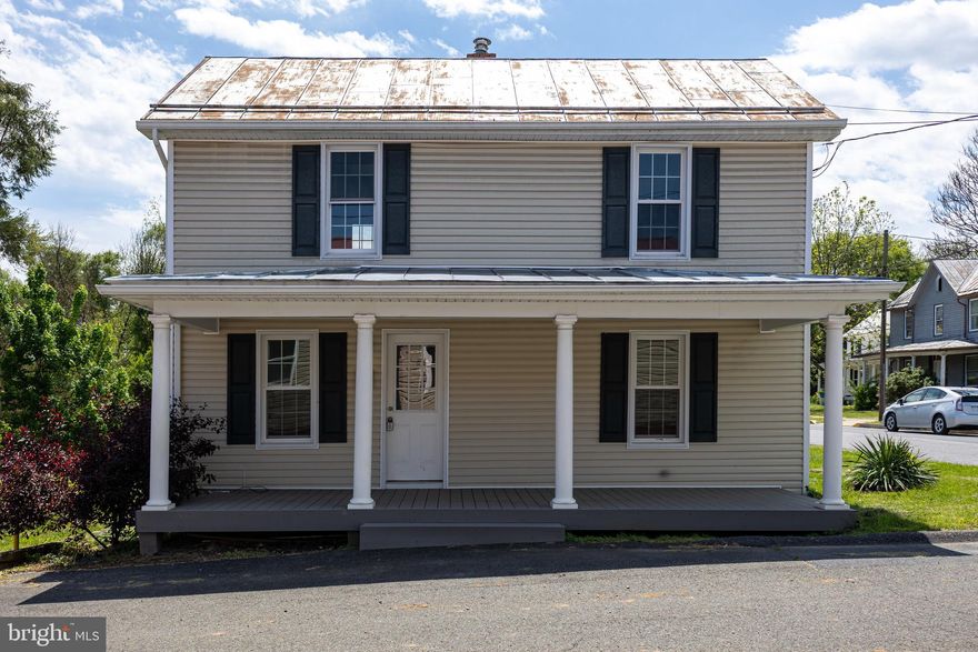 Why rent when you can own this charming 2 bedroom, 1 full bath home in Woodstock? Enjoy falling asleep to the soothing sound of rain on the metal roof while taking advantage of the many updates completed over the years including vinyl siding, replacement windows, an updated front porch, new carpet in the upstairs bedrooms, new living room flooring, and replacement of the rear portion of the roof. Previously used as a rental, this property offers a low maintenance yard and exterior, plus an outbuilding for extra storage, all conveniently located close to everything Woodstock has to offer.