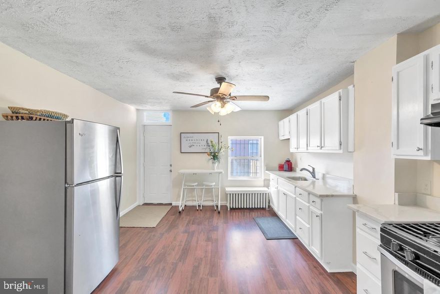 Discover a hidden gem in the heart of McElderry Park! This charming 3-bedroom, 1-bathroom townhouse, built in 1915, offers a unique blend of traditional architecture and modern investment potential. With an unfinished basement, the opportunity for additional living space or rental income is at your fingertips. Imagine transforming this classic brick home into a cozy retreat or a lucrative rental property. The spacious layout invites creativity, allowing you to design a space that resonates with future tenants or buyers. On-street parking adds convenience, while the vibrant neighborhood promises strong rental demand. Investors will appreciate the potential for appreciation in this up-and-coming area, making it a smart addition to any portfolio. With no association fees and a solid foundation, this property is ready for your vision. Don't miss out on the chance to turn this house into a home that generates returns!