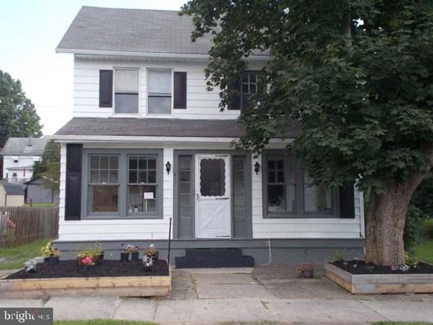 Updated kitchen and bath rear patio could be carport. Heated 8x23 enclosed front porch. Drive away along side of porch.