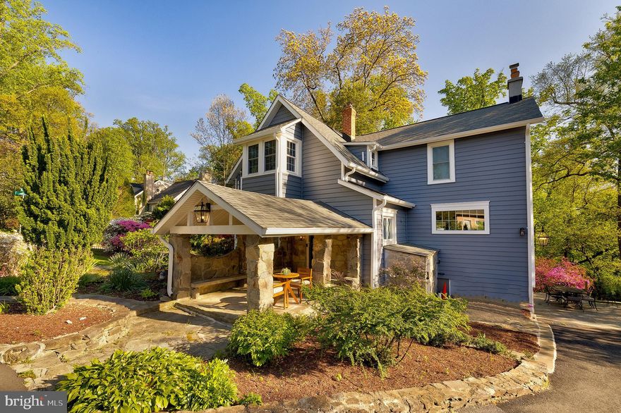 2925 Covington Rd - where character, charm and luxury coincide in this gem of a corner of Silver Spring. Named ‘Sunset Cottage’ because of its gorgeous views, this warm and lovely home is one-of-a-kind.  Write your own fairy tale as you walk through the doors of this lovingly cared for and upgraded spacious 3 bedroom 2 full bathroom Victorian-era home. The sellers have handled all the hard stuff, you just have to move in. From the inside to the outside, the property wows at every turn. The first floor features not only a beautiful renovated kitchen leading to a formal dining and living room but also a great room with a wood-burning stone fireplace. Upstairs the renovated and expanded bathroom is pure luxury. Three large bedrooms have tree-lined views of Rock Creek Park. The basement has a small semi-furnished space with a decorative fireplace and storage/original wine cellar. You won't just love the inside; outside,  embrace the beauty of a mature garden with lots of privacy due to the verdant landscaping and positioning of the house.  With a wrap-around porch on one side, an expansive patio on the other, and a breathtaking lawn in between, you will love everything about this home and its stunning features.