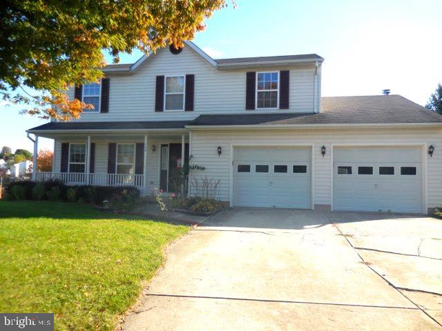 Fantastic Offering! 4 bedroom 2.5 bath home with covered front porch and raised deck off kitchen overlooking large back yard. 2 car garage, partially finished walk out basement, CAC and family room with fireplace. This is a Fannie Mae Homepath Property.