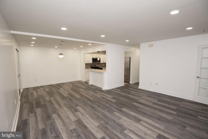 Welcome to this stunning fully renovated condo with 2 bedrooms and 2 full bathrooms. Modern and stylish with  range of desirable features and amenities that are sure to impress is how I describe. As you enter, you'll be greeted by the warm and inviting ambiance created by the recessed lighting throughout the condo. Kitchen is a chef's dream, featuring stainless steel appliances and a convenient breakfast bar, perfect for casual dining or entertaining guests. The newly installed kitchen backsplash adds a touch of elegance to the space. Home also has a spacious living room provides plenty of room to relax and unwind, while the ample closet space ensures you have plenty of storage for all your belongings. Engineered hardwood flooring in the bedrooms, living room, dining room, and hallway adds a touch of sophistication and durability to the condo. Enjoy the natural light and easy access to the outdoors through the patio doors. For added convenience, a washer and dryer are included in the unit. It also boasts charming arched doorways that add character and charm to the living space. In addition to the fantastic features there is a wide range of amenities for residents to enjoy. Take a dip in the indoor or outdoor pool while enjoying the perfect poolside views. Spend some quiet time in the library or socialize in the community room. Take advantage of a deck &  game room, complete with multiple pool tables and a ping pong table, offer endless entertainment options. Stay fit and active in the gym/weight room, and make use of the event space for special occasions. Don't miss your chance to own this fully renovated condo with an abundance of amenities. It offers both comfort and convenience in a desirable location. Schedule a viewing today and make this your dream home.