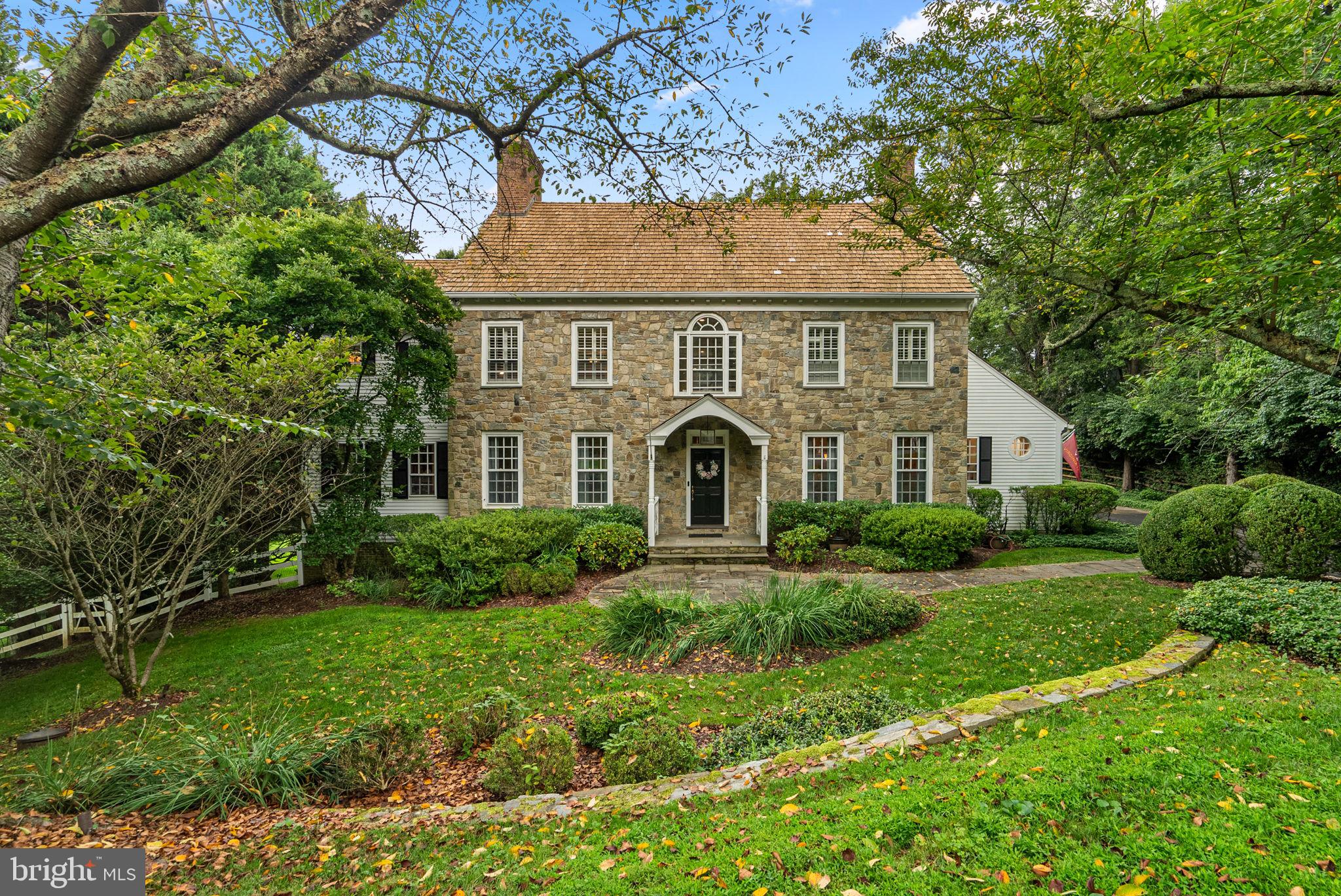 Welcome to 10306 Cutters Lane – A Timeless Masterpiece in the Heart of Potomac
Tucked away at the end of a quiet cul-de-sac, this stunning custom-built home by renowned builder Brendan O’Neil offers over 8,000 square feet of luxurious living space across four beautifully finished levels.
Classic New England charm meets modern elegance in this grand residence, sited on a 1.14-acre lot of manicured grounds, mature trees, and private outdoor spaces perfect for entertaining or quiet retreat.
Inside, rich dark wide-plank hardwood floors, soaring ceilings, and detailed custom moldings set the tone for a sophisticated yet inviting atmosphere. The main level is designed for both formal and casual living, featuring a gracious living room, formal dining room, cozy library, and a spacious family room — each adorned with elegant gas fireplaces.
The chef’s kitchen is a true showstopper, outfitted with a Viking range, farmhouse sink, custom cabinetry, and an expansive island that comfortably seats eight. It opens seamlessly to the family room with a floor-to-ceiling stone fireplace, creating a warm and connected gathering space. Step outside to the large screened-in porch and deck, perfect for year-round enjoyment.
A custom mudroom with built-in storage, laundry area, and a chic powder room completes the main level.
Two separate staircases lead to the second floor, where you'll find four generously sized bedrooms, each with private en-suite bathrooms and walk-in closets. The primary suite is a true retreat, featuring a large bedroom, spa-inspired bathroom, dual walk-in closets, and a private balcony overlooking the serene backyard.
The third level loft offers flexible space ideal for a teen suite, guest quarters, home office, or playroom.
The fully finished walkout lower level is perfect for entertaining and relaxing, with a media room, full bedroom and bath, and access to a slate patio—ideal for hosting guests or enjoying a quiet evening under the stars.
Just 4 miles from Potomac Village and within easy reach of Bethesda, Rockville, and Washington, DC, this home offers the perfect blend of privacy, elegance, and convenience.
Don’t miss this rare opportunity to own a one-of-a-kind luxury estate in the heart of Potomac. Schedule your private tour today!