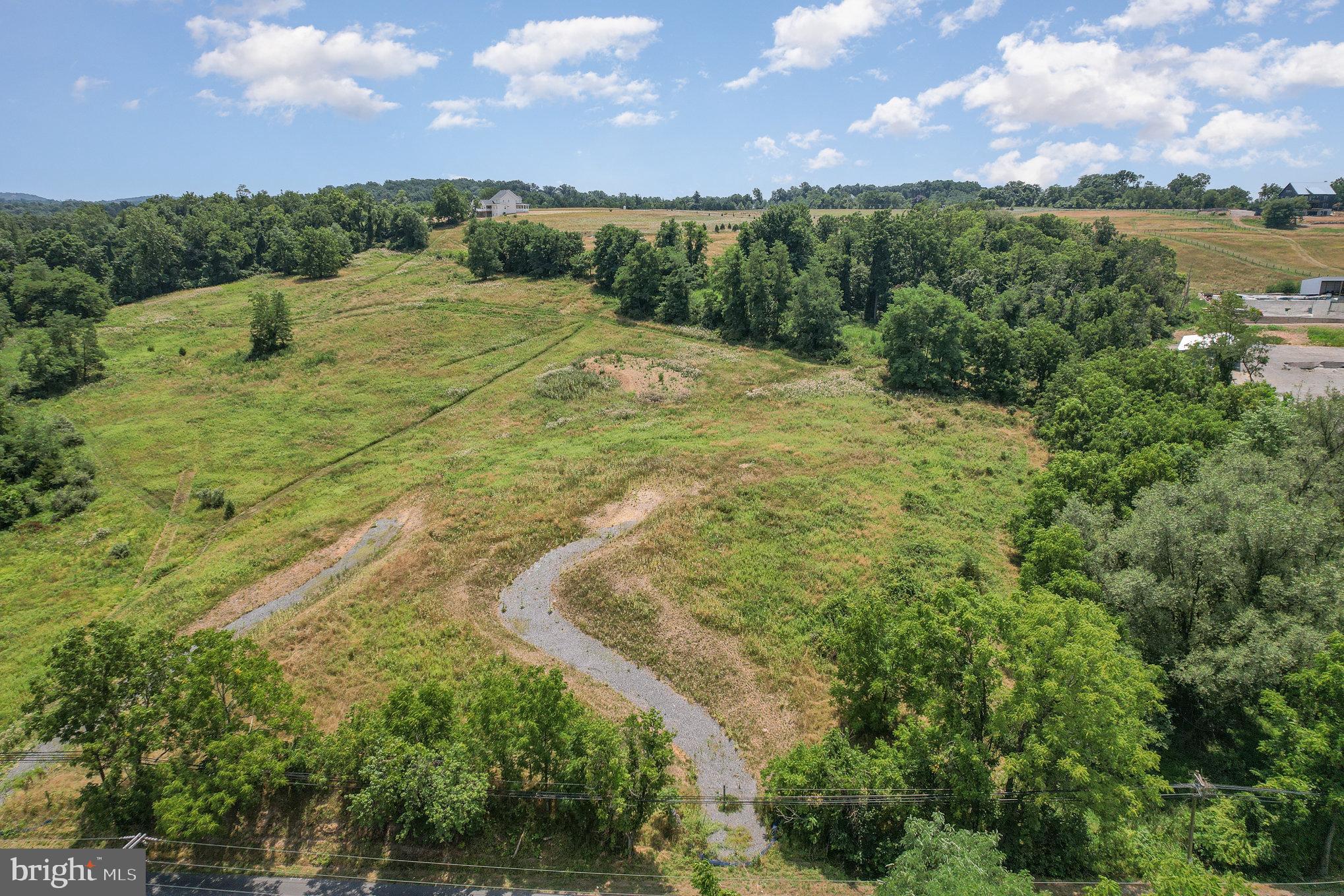 Lot 19 - 2.84 acres - Discover Serenity at Mowery Orchards. Located near Messiah College and Bowmansdale. This intimate homesite surrounded by woodlands is adjacent to 54 acres of preserved ground. Partner with our team—featuring a visionary Architect, an innovative Interior Designer, and renowned Tru Construction—to design and build a residence that maximizes the unique rolling topography and expansive views. Here, your dream home will seamlessly integrate elegance with nature's grandeur. Residents of Mowery Orchards will enjoy exclusive access to a scenic one-mile walking loop, winding through 54 acres of preserved woodlands. The lush trails, abundant with wildlife, run alongside the serene Pippin Run, offering a peaceful retreat into nature. Select from a variety of spacious lot sizes ranging from 2 to nearly 4 acres, each promising a unique canvas for your architectural dreams. At Mowery Orchards, your future home awaits amidst nature’s masterpiece.
