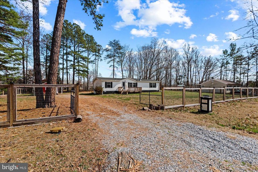 Welcome to this charming 3-bedroom, 2-bath ranch-style home located at 26271 Dogwood Dr in Ruther Glen, offering comfortable one-level living in a peaceful residential setting.
This well-maintained home features new flooring throughout the main living areas and a beautifully renovated kitchen with quartz countertops, creating a fresh and modern space perfect for everyday living and entertaining. The home also includes a versatile office/den, ideal for working from home, a study area, or a flexible room to suit your lifestyle needs.
Recent improvements add even more value, including a new heat pump for efficient heating and cooling and a new septic system installed in 2022, giving buyers peace of mind for years to come.
Step outside to enjoy the fully fenced yard, perfect for pets, outdoor gatherings, gardening, or simply relaxing with added privacy. The property also features a double shed with a workshop, providing excellent space for storage, hobbies, or projects. A 2-car carport offers convenient covered parking and additional storage.
With its thoughtful updates, functional layout, and generous outdoor space, this home offers a wonderful opportunity for comfortable living while still being conveniently located near major routes, shopping, and everyday amenities.
A fantastic opportunity to own a well-cared-for ranch home in the heart of Ruther Glen.