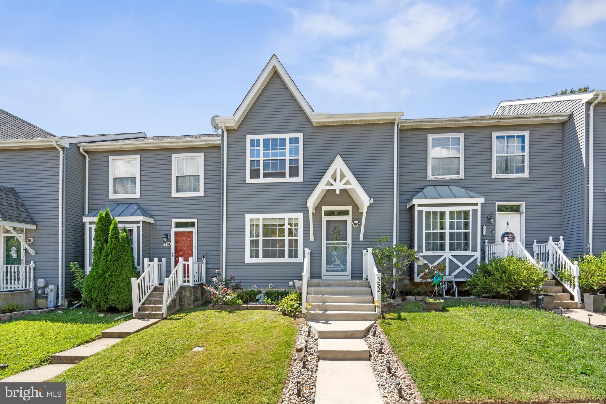 Welcome home to this beautifully maintained townhome offering comfort, functionality, and space to entertain! As you enter, you're greeted by durable LVP flooring that flows throughout the main level. The bright and spacious living room is perfect for hosting guests or relaxing after a long day. The eat-in kitchen features an abundance of cabinetry, granite countertops, stainless steel appliances, and plenty of prep space-ideal for cooking and gathering. Just off the kitchen, the dining area is the perfect spot to wine and dine with friends and family. A main-level powder room adds extra convenience. Upstairs, the spacious primary bedroom offers generous closet space and direct access to a full bathroom, perfect for unwinding in comfort. An additional sun-filled bedroom provides flexibility for guests, a home office, or whatever your lifestyle requires. The fully finished lower level includes a full bath and offers room for a recreation space, media room, or second living area, with walkout access to the fully fenced backyard - perfect for pets, play, or relaxing evenings. Enjoy summer BBQs on the newly updated deck, and never worry about parking with two assigned spaces right out front. Don’t miss your chance to make this move-in ready home your own!