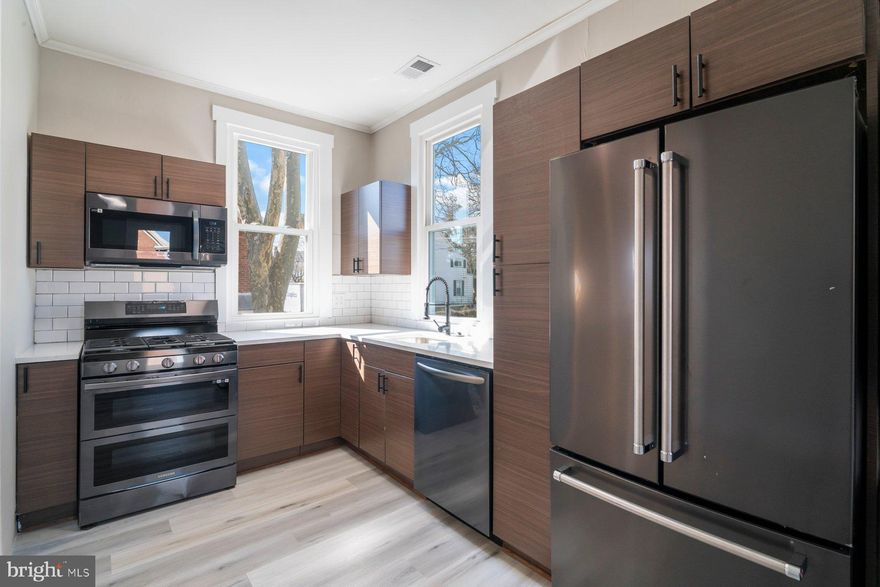 Newly renovated top floor apartment with high end features offering 2 large bedrooms, a walk in closet, a luxury bathroom, a storage room, central air conditioning & gas heating, and a private deck for outside relaxing.  There is also a provided in unit washer/dryer and pest are considered on a case by case basis.  All applicants must have a 620 minimum credit score, and total household income of 2.5 time the monthly rent.