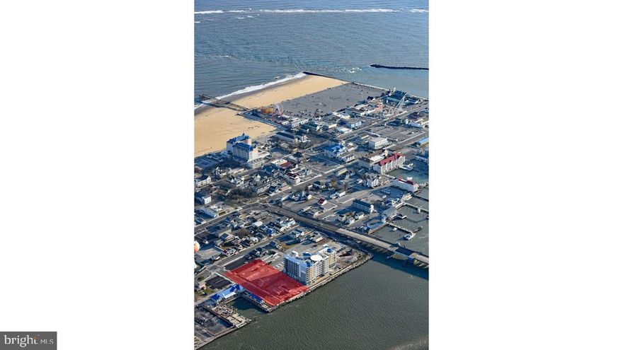+/- .0764 acres of  waterfront, bayside, commercial land available right next to the Cambria Hotel in Ocean City, Maryland.  Can build a 27-unit residential condo project, 'By-Right.'  The property is tied into City of Ocean City's water and sewer. On site parking  is available. Contact the listing Broker for additional details.