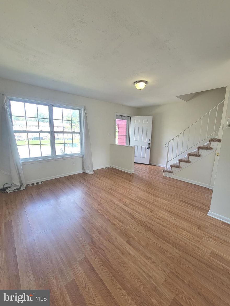 Home Sweet Home - the perfect home for all your needs.
This home is airy with lots of natural light coming into the main level with gleaming wood floors in the open living area.  The kitchen is very spacious with lots of cabinet space and dining for those family meals.  The upper levels has fresh carpet with a generous size primary room and two additional bedrooms along with an updated full bath.  Come downstairs to the fun, the recreation and family room in the basement with a second full bath, and computer or gaming nook which leads to the patio and fenced rear yard.

Minutes to 95 & 40, Close to all major shopping