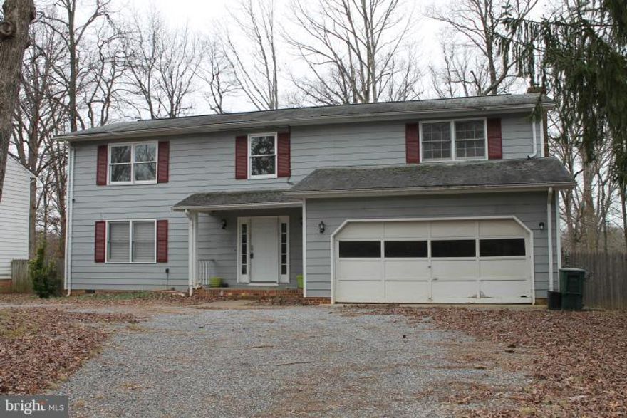 Stop the car in Sheraton Hills.Colonial home with updated areas on both levels. Cherry hardwoods on main level w/ updated kitchen with granite and stainless package.  Two wood burning fireplaces, new sliding door on main level.  Additional HVAC added for two zone system. Outside needs TLC but look at interior pictures.  Priced to move.