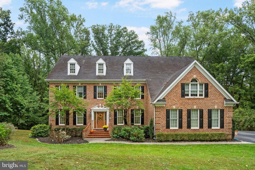 Welcome to 7 Celtis Court in Fork, Maryland 21051, a breathtaking testament to luxury and craftsmanship. This expansive 7,500+/- square foot residence, gracefully situated on an expansive 3-acre lot at the end of a tranquil cul-de-sac, promises an extraordinary living experience. Boasting 5 bedrooms and 4.5 baths, this home offers spacious living and ample room for family and guests.

As you step inside, the elegant crown molding and gleaming hardwood floors throughout the main level set the tone for the sophistication that permeates every corner of this home. The living room, a cozy retreat in its own right, features a wood-burning fireplace, providing warmth and ambiance to gatherings.

The open floor plan seamlessly integrates the kitchen, dining area, and living room, creating an ideal space for both daily living and grand-scale entertaining. Formal living and dining rooms add an extra layer of refinement for special occasions.

The primary suite is a sanctuary, offering his and hers walk-in closets and a lavish bathroom with a Jacuzzi tub, separate shower, and double vanity. But the luxury doesn't stop there. The fully finished basement is an entertainment haven, complete with a sauna and a full bath conveniently attached to the gym. This space also boasts a sprawling family room with a built-in gas fireplace and a projector TV, and a custom pub room adorned with coffered ceilings, perfect for entertaining guests.

Throughout the home, custom window treatments and draperies enhance both the aesthetics and privacy of each room, adding a final touch of sophistication to this remarkable property. Additional amenities include a 3-car garage, a whole-house generator, outdoor lighting that beautifully illuminates the picturesque surroundings, and a spacious deck overlooking the serene woods. This property transcends the definition of a mere home; it embodies luxurious living in Fork, Maryland, inviting you to experience comfort, elegance, and timeless appeal at its very best. *** NO HOA ***