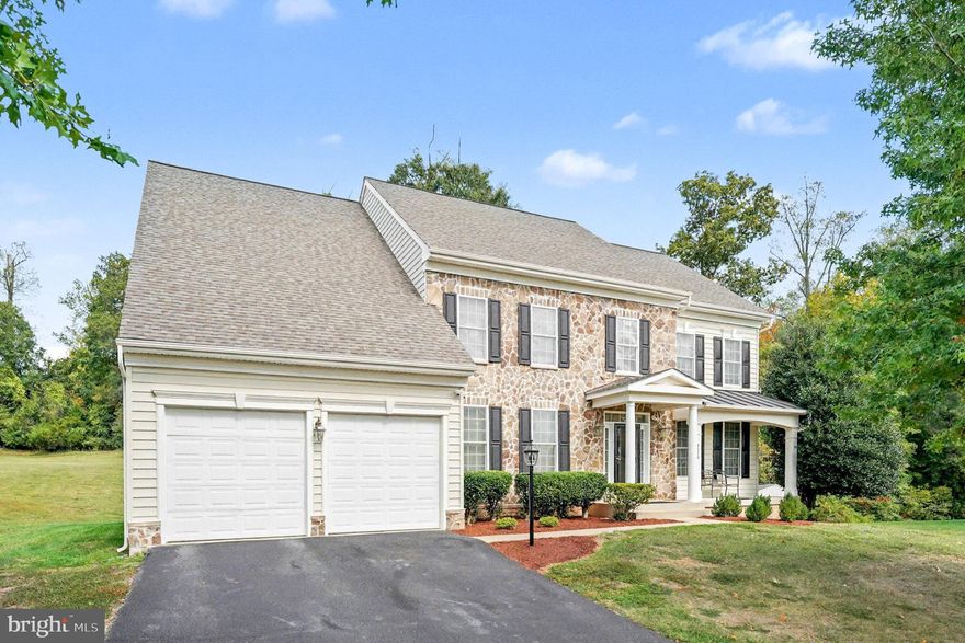 Welcome to the Luxury Single Family Home at Potomac Crest. Built in 2006  Beazer Home Corp. Avery Style home.  Set back in a quiet community, minutes from  I95 or route 1 & Quantico Marine Base. This large home is 5,640 Total Sq. Ft. and is setting on a large .59 Acres of land.  The Home  has a large two story entry with office on left and setting room on the right. Walking straight ahead is the beautiful stair to second floor open hallway, then to back spacious kitchen with dining and large Island eat in,  to right of kitchen is large formal dinning with chair railing and shadow boxing trim and crown molding, plus a nice bay window , over looking the back yard. To the left of the kitchen / Dining is a large family room with Stone Fireplace/Gas log with trim out ceiling. Plus a powder room in the hall to the kitchen & stairs to the basement. The Dining /Kitchen also has laundry rm which leads to the garage entry , plus to the back wall there is a set of doors with panels of glass & transom glass above, which leads to a back deck which is a 12 x12 wooden deck for dining out side or grilling, It truly is a nice set up . Up stairs  off of the open hallway there are two beds room with shared full bath with double sinks and at one end  a large bed room with full bath at the other end is a large Primary Bed room with spacious setting area for couch /TV , refrigerator   to relax before going the large bed room with (Again Large) walk in closet. Then the Primary Bath room , has Linen Closet then and corner soaking tub with a long vanity and sinks on each end, The Toilet has it own room and the walk in large shower with double shower setup for two people no problem. The last but not least is the basement with large Rec Room and full bath, plus an exercise room to the back and storage in the spacious furnace room and in addition is a 6' wide opening with French dr. and steps to the back yard. Easy way to move furniture, exercise equipment and pool table in and out of the basement.
