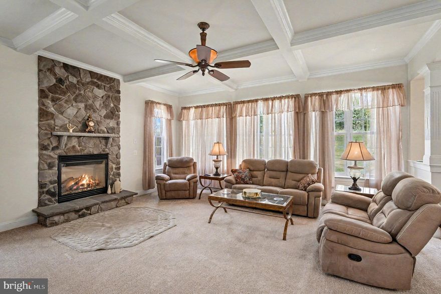 Welcome to the Luxury Single Family Home at Potomac Crest. Built in 2006  Beazer Home Corp. Avery Style home.  Set back in a quiet community, minutes from  I95 or route 1 & Quantico Marine Base. This large home is 5,640 Total Sq. Ft. and is setting on a large .59 Acres of land.  The Home  has a large two story entry with office on left and setting room on the right. Walking straight ahead is the beautiful stair to second floor open hallway, then to back spacious kitchen with dining and large Island eat in,  to right of kitchen is large formal dinning with chair railing and shadow boxing trim and crown molding, plus a nice bay window , over looking the back yard. To the left of the kitchen / Dining is a large family room with Stone Fireplace/Gas log with trim out ceiling. Plus a powder room in the hall to the kitchen & stairs to the basement. The Dining /Kitchen also has laundry rm which leads to the garage entry , plus to the back wall there is a set of doors with panels of glass & transom glass above, which leads to a back deck which is a 12 x12 wooden deck for dining out side or grilling, It truly is a nice set up . Up stairs  off of the open hallway there are two beds room with shared full bath with double sinks and at one end  a large bed room with full bath at the other end is a large Primary Bed room with spacious setting area for couch /TV , refrigerator   to relax before going the large bed room with (Again Large) walk in closet. Then the Primary Bath room , has Linen Closet then and corner soaking tub with a long vanity and sinks on each end, The Toilet has it own room and the walk in large shower with double shower setup for two people no problem. The last but not least is the basement with large Rec Room and full bath, plus an exercise room to the back and storage in the spacious furnace room and in addition is a 6' wide opening with French dr. and steps to the back yard. Easy way to move furniture, exercise equipment and pool table in and out of the basement.