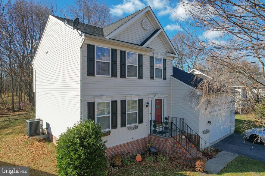 Welcome to 617 Talisman Drive! A few key updates on the home include a new roof placed in 2020, water softener in 2024, water heater in 2023, new HVAC exterior 2021, new HVAC interior 2024, and completely renovsated Owner's Bathroom! This lovely home is part of the Laurel Ridge subdivision, located on the last street backing against a wooded area. This makes for a private perfectly flat backyard with mature trees for shade. As you enter the home, the foyer area has a coat closet for easy drop off and a half bath for convenience. To your left, you'll find an office space, and to your right is the entrance to your 2-car garage. Directly ahead, the home opens up to a large span of kitchen flowing to dining and living area. The kitchen features a huge island and ample counter top space. The dining area has a sunny door to the backyard, while the living room is in the cozy far right corner. Upstairs, you'll find the owner's suite with a beautifully renovated bathroom featuring a double bowl vanity, soak tub, and tiled shower with glass door! Across the hall are bedrooms 2 and 3, as well as the second full bathroom. The full unfinished basement is home to the washer and dryer and walk-up stairs that lead to the back yard. With lots of space for the imagination, the basement is already roughed-in for an extra bathroom and could be easily finished for extra living space or kept for ample storage. The spacious garage has an automatic garage door opener and a 240-volt plug installed. More information on the MLS, ask your favorite agent for the 3D Tour! Schedule your in person showing today!