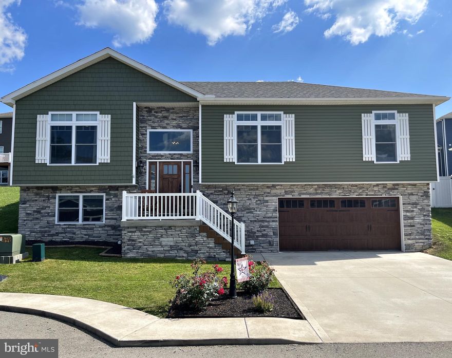 "Gorgeous Gracie" 3 bedroom, 3 bathroom, 2500 +/- sqft home just minutes from I-68 in Summers Ridge South Development. Built in 2019, this home features Hickory Hardwood Floors throughout and a beautiful floor to ceiling, double - sided fireplace splitting the dining and living room. This spacious kitchen features a tile backsplash leading down to granite counters, shined by under cabinet lighting, and a breakfast bar. The primary bedroom offers gorgeous trey ceilings with plenty of natural light. Custom attached bathroom with WIC and garden tub featured by the custom tile shower. Full, finished basement with plenty of room to play and with garage access. The back yard is built to entertain with a large back patio/deck that is half covered. Enjoy a nice evening watching the outdoor tv or playing in the private yard surrounded by the privacy fence. Call for your private showing today!