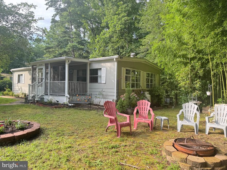 Affordable Coastal Living in Lewes!
This 3-bedroom, 2-bath doublewide in the leased land community of McNicol Place is your opportunity to create the beach getaway or year-round home you've been looking for.  This home offers great potential with a spacious layout that includes both a living room and a family room, a screened porch, and even an outdoor shower—perfect for rinsing off after a day at the beach. HVAC has been replaced!  Enjoy evenings around the front yard fire pit or explore all that coastal Delaware has to offer just minutes away—Cape Henlopen State Park, bike trails, tax-free outlet shopping, dining, and entertainment.

Community application with Equity LifeStyle Properties, Inc. Is required with credit check (including debt-to-income ratio), income verification, and background check.