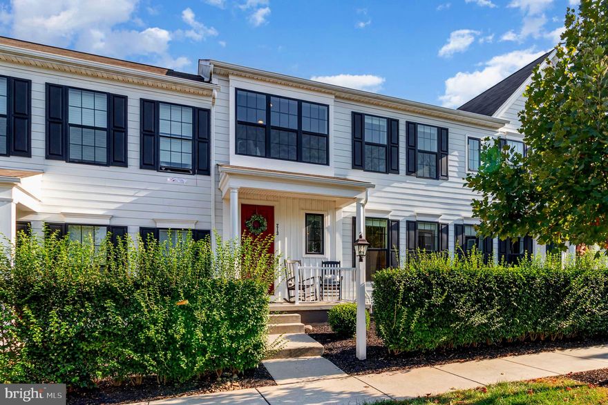 Stunning Townhome in The Highly Desirable Walden Neighborhood   Discover this charming and meticulously maintained townhome located in the award-winning Walden Neighborhood by Charter Homes. This exquisite residence features a spacious open floor plan, gleaming, abundant natural light, a convenient powder room, and a bonus front room —perfect for remote work or study. The modern kitchen is equipped with stainless steel appliances, elegant granite countertops, a gas cooktop, and a large island that seamlessly extends into the cozy family room —ideal for entertaining guests. The eat-in area provides a welcoming flow to the fenced-in backyard, perfect for outdoor gatherings. Upstairs, the luxurious Owner's Retreat boasts ample natural light, a generous walk-in closet, and an en-suite bathroom featuring an oversized stand-alone shower, and double vanities. Two additional bedrooms, a full bath, and a designated laundry area complete the upper level. This home also includes a two-car detached garage for your convenience.The Walden Neighborhood offers an array of fantastic amenities, including a clubhouse, pool, gym, Pilates studio, childcare center, salon, restaurant, pizza shop, coffee shop, pub, and retail shops. Don’t miss out on this exceptional opportunity—make sure to explore Terra Park as well!