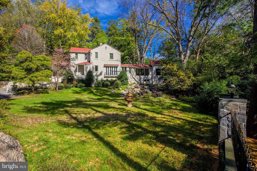 Fantastic opportunity to own a property on a large lot in a prime Washington, D.C., location...... This grand, renovated residence is on a gorgeous three-quarter-acre lot with beautiful rock ponds and fountains, and in a prime Washington neighborhood near embassies and ambassadors' residences. This home offers beautiful space for elegant entertaining, and the private gated drive, lined with fountains, can accommodate parking for 12+ cars. This Mediterranean-style home underwent a significant expansion and full renovation in 2011. The home boasts a beautiful sun room and a party room with large picture windows overlooking the ambiance of rushing water, rock pond and a lush green lawn. A gourmet kitchen offers high-end stainless appliances; and the dining room has French doors opening to a terrace for outdoor dining. The 7 bedrooms and 6 1/2 baths are spaced around the home, making the layout ideal for guests. This home offers a large, multi-room primary suite that includes the bedroom, deluxe bath with steam shower, an office or work area with built-ins, a separate sitting or media room, and a large walk-in closet. The extensive landscaping, with rock ponds, fountains, flowing water and stone walls, was designed by a feng shui master. This ideal location is close to Rock Creek Park as well as easy access to downtown Washington.