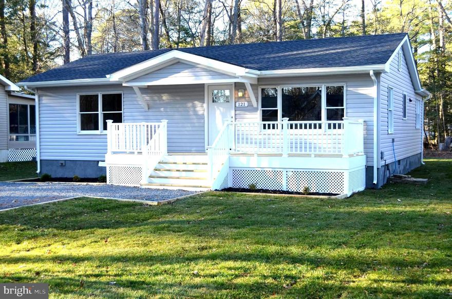 Beautifully renovated ranch style home in active community of Ocean Pines. Home features 3bed/2baths with open floor plan.  Move in ready as the following features are all brand new: Roof, siding, gutters, hot water heater, HVAC units, decking, gravel drive and fresh landscaping. The kitchen and baths have been completely remodeled and include new appliances, cabinetry, lighting, fixtures, and hardware. Home has been freshly painted and includes all new flooring. Separate laundry area/pantry off kitchen along with additional attic storage. Enjoy outdoor entertaining as this home features both front and back decks. Spacious yard and shed with electric for additional storage. Located minutes from Maryland Beaches with an array of community amenities including multiple pools, community center, marina, boat ramp, club house, basketball, volleyball, tennis and golf with membership. New Plat estimates interior Total SQFT as 1214. Tax record has not been adjusted accordingly. Whether a home year round or a seasonal retreat, this home defines Coastal Living at its finest!