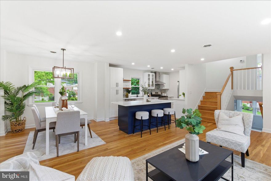 Stunning split-level home in the highly desirable Campus Hills community—this is the one you’ve been waiting for. Beautifully updated and filled with natural light, the home offers a spacious, open floor plan with a seamless flow that’s perfect for both everyday living and entertaining.

The chef-inspired kitchen is a true showstopper, featuring elegant quartz countertops, stainless steel appliances, gas cooking, and an oversized island with abundant storage and seating. It opens effortlessly to the main living areas, creating a bright and welcoming heart of the home.

The upper level showcases three generously sized bedrooms with gleaming hardwood floors, including a serene primary suite with a private en-suite bath. Just a few steps down, the first lower level offers a large, inviting family room complete with custom built-ins and a stylish electric fireplace—ideal for cozy nights in. This level also includes an additional bedroom and full bath, perfect for guests or multi-generational living.

The versatility continues with a second lower level, providing even more flexible space to suit your needs—whether it’s a fifth bedroom, home office, gym, media room, or playroom.

Outside, enjoy a flat, fully fenced backyard designed for entertaining, relaxing, or play, offering plenty of room to create your ideal outdoor oasis.

Additional highlights include multiple living zones for privacy and flexibility, thoughtful updates throughout, and a voluntary HOA at just $50 per year. With its generous layout, modern finishes, and prime location, this home delivers comfort, style, and endless possibilities.