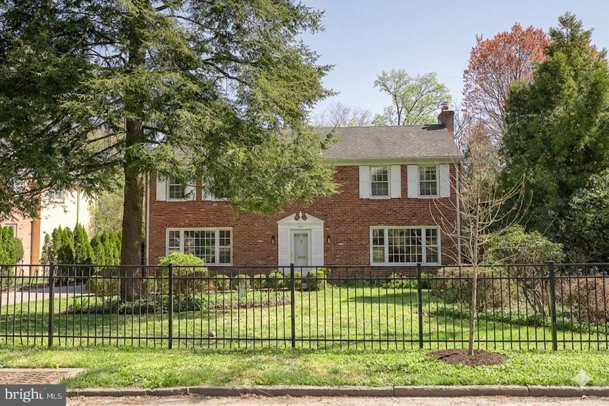 421 Wister Road is definitely not your typical brick colonial.  This very special home must be seen in person to be fully appreciated.  The 4-bedroom, 3.5-bath residence has been thoughtfully and beautifully transformed by its current owners with a stunning three-story addition, completed in 2016.  The result is an expansive, light-filled living space designed to seamlessly bring the outdoors in. The Family Room will exceed expectations, featuring white oak hardwood floors and walls of windows that flood the space with natural light.  Sliding French barn doors open to a breathtaking fully conditioned sunroom with a vaulted ceiling, Palladian window, tile flooring, and three walls of windows with easy access to the private deck and paver patio- perfect for enjoying the serene backyard. The spacious eat-in kitchen is ideal for both everyday living and entertaining, offering a long center island with seating for 3-4, space for an additional table, double ovens, a separate 5-burner Bosch cooktop with retractable vent, pantry, granite countertops, radiant heated floor, and abundant cabinetry. The formal dining room showcases a fireplace with wood-burning stove insert, while the den provides the perfect retreat for relaxation. A cheerful mudroom with a window bench leads to the driveway and small covered side deck- especially convenient in inclement weather. The primary suite, part of the addition, features two custom outfitted walk-in closets and a spa-like bathroom complete with a BainUltra freestanding air tub, custom double vanity and an oversized frameless glass shower.  A well-appointed Laundry Room featuring checkerboard tile flooring, fulll size washer and dryer, sink and cabinetry is just off the primary suite.  Three additional spacious bedrooms, one an ensuite, all with deep closets, and a full hall bath complete the second floor. Two staircases provide access to the lower level, which includes a finished Bonus Room, unfinished storage room and direct entry to the integral two-car garage and additional storage room.  The large level fenced backyard is truly exceptional - a wildlife haven, private and peaceful with a mature garden featuring an array of perennial edible plants. The best of all worlds...perfect, quiet location in Lower Merion Township, in a walkable neighborhood minutes to shopping, schools and restaurants as well as to downtown Philadelphia, 30th Street Station and Philadelphia International Airport.  You won't want to miss this very special opportunity!