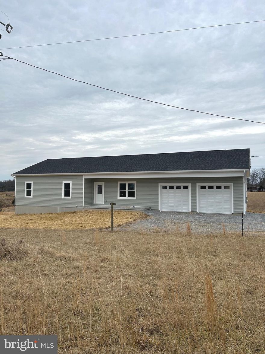 Unrestricted. Sitting on a lovely, 2.13 acre lot off Providence Church Road. There are 9' Ceilings throughout this 3 Bedroom 2Bathroom home. There is a full walk out basement with rough in plumbing in place. The home has 1,624 finished sqft with an addtional 1,624sqft Basement and a large 755sqft garage. You are surrounded by larger tracks of land currently farmed. There is an oversized deck off the kitchen with steps to the back yard or basement door. We are a couple weeks out from completion. Waiting for the weather to change for final grading, seed and straw.   Final Cleaned, with deck and garage doors on pictures to come soon. Please find attached Plat and House Plan.