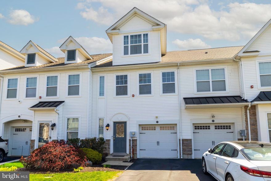 Welcome to 303 Ross Ct, a well‑kept townhome in the gated Wyngate community in Cheltenham Township. The first floor offers a welcoming foyer with direct access to the garage, a large storage closet, a powder room, and a dining area that sits beside the kitchen. The kitchen features stainless steel appliances, granite counters, and a breakfast bar that opens to the living room. A sleek, wall‑mounted electric fireplace adds a warm focal point to the living area, and just beyond it, the sunroom brings in natural light and leads out to the rear patio.

Upstairs, the spacious primary bedroom includes two closets—one a large walk‑in—and an en‑suite bath with a stall shower. A second bedroom, a full hall bath with a tub/shower, a dedicated laundry room, and a linen closet complete this level.

Head up to the third‑floor loft, a flexible space that can serve as a third bedroom, home office, gym, studio, or additional living area. A very large walk‑in closet adds valuable storage and functionality.

An attached garage and driveway parking add everyday convenience. The location offers quick access to shopping, parks, Rt 309, and the PA Turnpike, providing excellent connectivity to major routes.