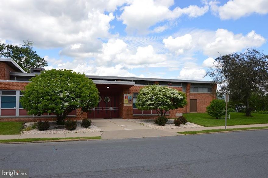 This building is a classic structure. Built in 1960 and still remains a multi use building today. The building
hosted religious centers, sporting activities, including basketball, volleyball, soccer, pickleball, baseball and
many other activities. A social center for proms, weddings, birthday parties, etc. Quality built structure with onsite parking and plenty of green area. Parking 14+ on paved areas with 21+ additional parking on grass lot. A timeless classic structure ready for many possible uses in this R-1 District. There is a commercial kitchen complete with stainless steel cabinets and tables. Gym area is approximately 57' X 90' with 16' to18' clear ceiling height. Other free span area of the building is approximately 90' X 47' with 14' clear ceiling height. Full male and female locker rooms. Men and woman's multi stall rest rooms on each floor. The Sale is conditioned on the Seller's finding a new home for their services. Listing Agent(s) to accompany all showings. Showings must be coordinated with listing agents. Call for your private showing. Real Estate Taxes noted are based on the 1996 assessed value.