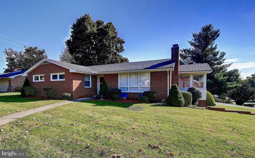 Brick Rancher on corner lot located in North Hagerstown. Detached Brick 3 car garage with plenty of additional parking. 3 Bedroooms, 2.5 bath, sunroom. Large kitchen with TONS of storage cabinetry and  Separate DR. FR w/ wood burning FP. LL Rec Room and oversize storage. Fenced rear yard. Central Air. Very well maintained and located within walking distance to all conveniences. Great Potential!