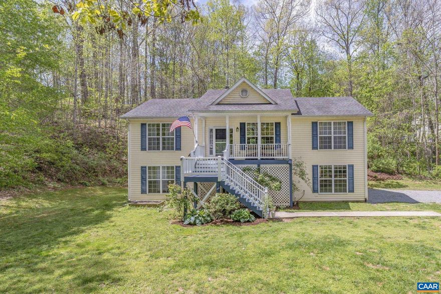 Charming Home in Twin Lakes in Ruckersville. Tucked away on a private, level lot with a stream, this inviting home offers the perfect blend of tranquility and convenience ? close proximity to NGIC, Shenandoah National Park, and CHO Airport. Step inside to find soaring vaulted ceilings, a cozy fireplace, and an open-concept living, kitchen, and dining area, all highlighted by gleaming hardwood floors. The main-level primary suite features a private bath, while a split-bedroom layout provides two additional bedrooms and another full bath. Updated black stainless kitchen appliances, baths, and NEW HVAC system being installed! The finished basement offers a spacious rec room, full bath, and laundry room, plus access to the oversized two-car garage. Relax on the expansive front porch or enjoy the peaceful setting from the secluded rear deck. This home is a rare find in a fantastic location! Back on the market at no fault to Sellers!,Formica Counter,Oak Cabinets