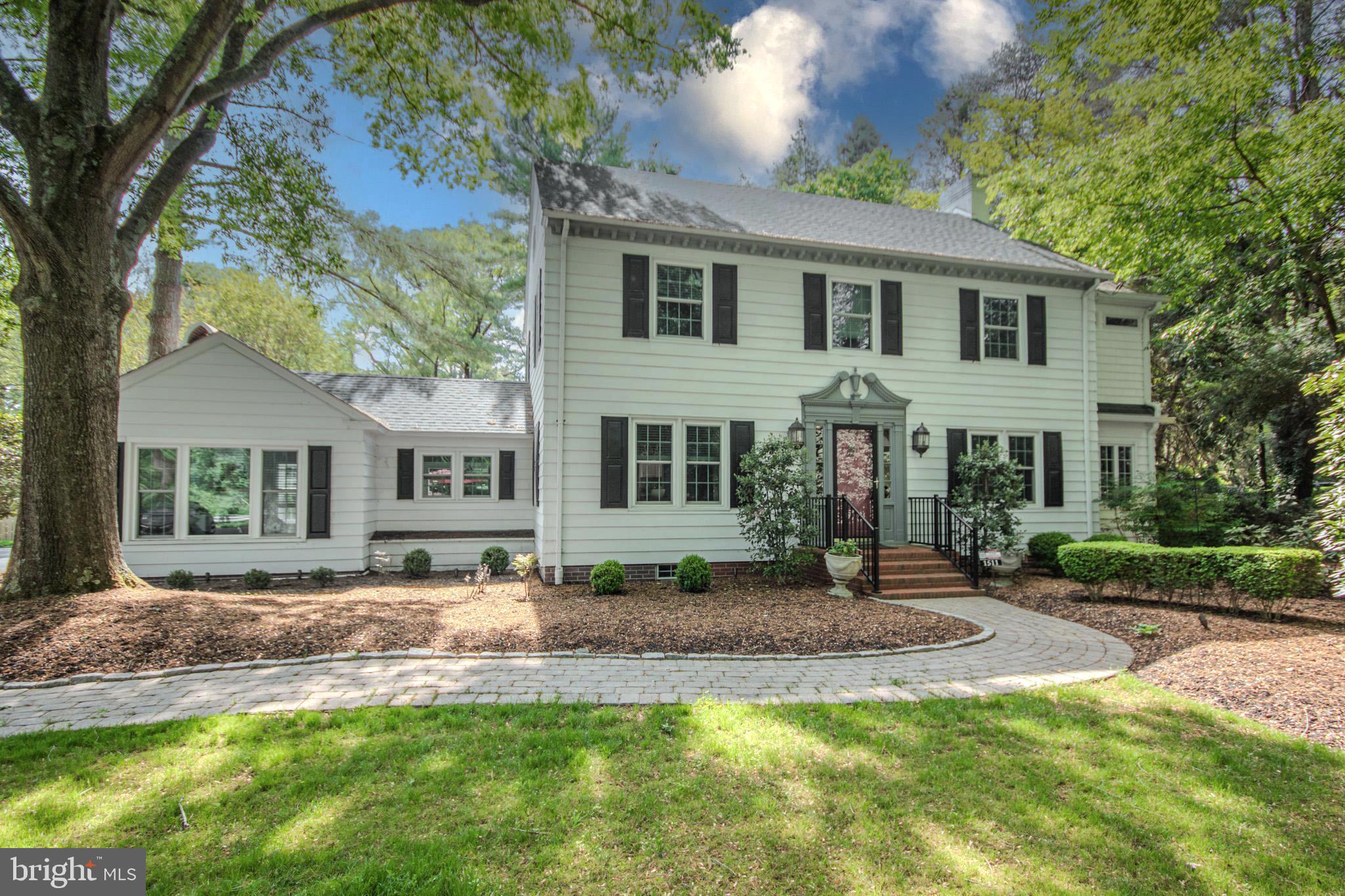 This stately colonial brings together classic charm and modern features embracing the best of both worlds. Designed by Robert Dashiell, known for his attention to detail and quality construction. On the first floor you will find a completely updated Kitchen with new tile, recessed lighting, cabinets, granite, stainless steel appliances, pot filler, a two cooling zone wine cooler, new ceramic herringbone tile backsplash and center island for all your culinary needs. The completely renovated large, sunken Family Room offers a relaxing area with a gas fireplace, exposed wood beams and tons of natural sunlight. The Formal Dining Room has beautiful Hardwood Floors, Crown Molding , Ornate Chandelier, Arched Doorway and Pocket Door leading to the kitchen. The Living Room features a wood burning fireplace, New sliding glass doors leading to the deck to enjoy nature and peacefulness. In addition, you will find a wonderful Library or Office with abundant windows letting in the natural light. As you go up the beautiful staircase you will find the Large Primary Bedroom, with walk-in closet, tray ceiling, gas fireplace, leading to the luxurious bathroom with an Oversized, Double Shower completed with River Rock and Waterfall Shower head. The new tile flooring with Radiant Heat, Towel Warmer, Granite Counter, and Custom Cabinets add to its grandeur. There are two additional bedrooms continuing with hardwood flooring and oversized hall leading to the walk up attic for additional storage including a cedar closet. The basement is currently being used as a gym/yoga area with an additional room and separate laundry area with ample cabinetry and new double utility sink. This home is located on the prestigious Camden Avenue offering nearly an acre of beautiful gardens, flowers, lush grass and mature trees all serviced with a four zone irrigation system. The backyard is completely fenced in adding to its privacy and tranquility. There is a large custom made wood burning outdoor fireplace to relax around and enjoy its splendor. You will also find a potting house with an outdoor shower and fenced dog run. As you stroll through the Zen path you will be surrounded with beautiful Azaleas, Roses, Japanese Maple and Clematis and Statuary with several relaxing seating areas. There is a 2 car garage with a new roof and additional carport. Call for your private showing.