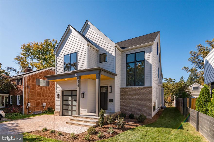 Finished and ready to move in! M-R Custom Homes presents this beautiful new custom home on a quiet street in Lyon Park, backing directly to a private neighborhood park and bike path. This home features 6 bedrooms, 6.5 bathrooms with 5,661 square feet of finished living space on four levels and beautiful seven-inch white oak hardwood floors throughout the main and upper levels. The main level includes 10ft ceilings, and a beautiful gourmet kitchen with custom inset maple cabinetry, quartz countertops, 48" Subzero Refrigerator, and 48" Wolf Range. The kitchen opens to the great room with a gas fireplace with tile and shiplap surround. The large rear screened porch with heaters and speakers offers an amazing outdoor living space overlooking the backyard and the park. A private study, mud room with built-in cubbies, and an attached one-car garage complete the main level. The upper level is highlighted by a luxurious primary suite filled with light and wonderful views of the park. The primary suite features dual walk-in closets, a spa-like bathroom with heated floors, double vanities, stand-alone soaking tub, and heavy glass enclosed shower. The 3rd floor loft, with full bathroom, is perfect for a private office, guest suite, or play area. The basement includes a spacious recreation room with a full-sized wet bar with island, exercise room, a finished storage room, and a bedroom with full bathroom. The 7250 square foot lot is deep and flat, offering an abundance of usable green space in the backyard, and even more in the park behind. Convenient to Lyon Park, Zitkala-Sa Park, the bike path, and Long Branch Elementary. Under a mile to Clarendon Metro and everything else in the heart of Clarendon.