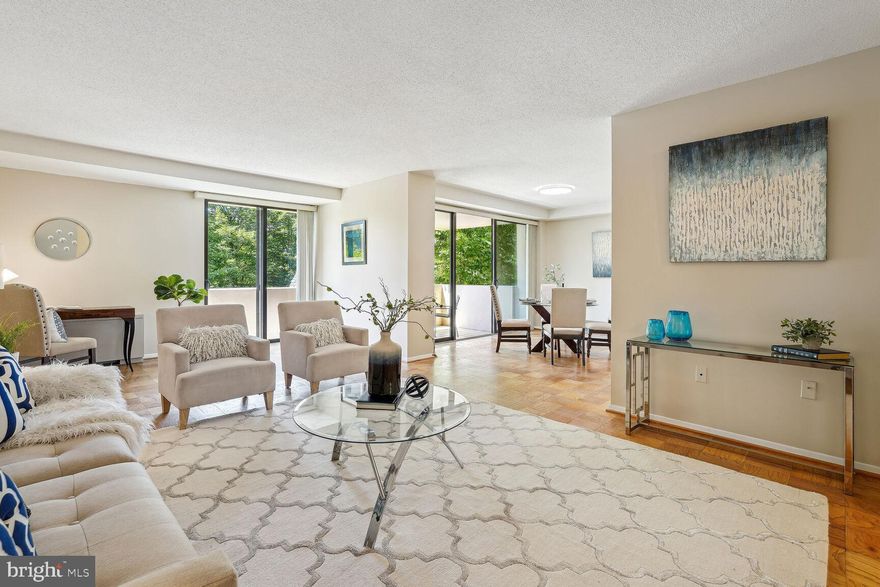 1,702 SF OF SPACE! // 1/2 MILE TO METRO! // CONDO FEE INCLUDES ALL UTILITIES! (electricity, water, gas, heating and cooling) //BRAND NEW GE PROFILE APPLIANCES  - gas stove, refrigerator, dishwasher, range hood // hardwood floors // This huge 2BR/2BA unit has 1,702 square feet of space, with several great storage closets in the unit! // Windows and sliding doors have all been replaced. // Spacious balcony gets great light (fantastic sunset view!) and has plenty of space for dining, entertaining, and relaxing! // UP TO THREE GARAGE SPACES possible per unit [$600/yr for one car,  $1,320/yr for two cars, additional charge for third]. // Many restaurants, shops, and night spots nearby.  // Harris Teeter next door, new Target nearby, and Ballston Quarter just across the street - very convenient! // Hyde Park is a great building with professional on-site management and a really excellent full-time staff. Amenities include a pool, a large private park with a gazebo and gas and charcoal grills, and a community garden. // SEE 3D VIRTUAL TOUR