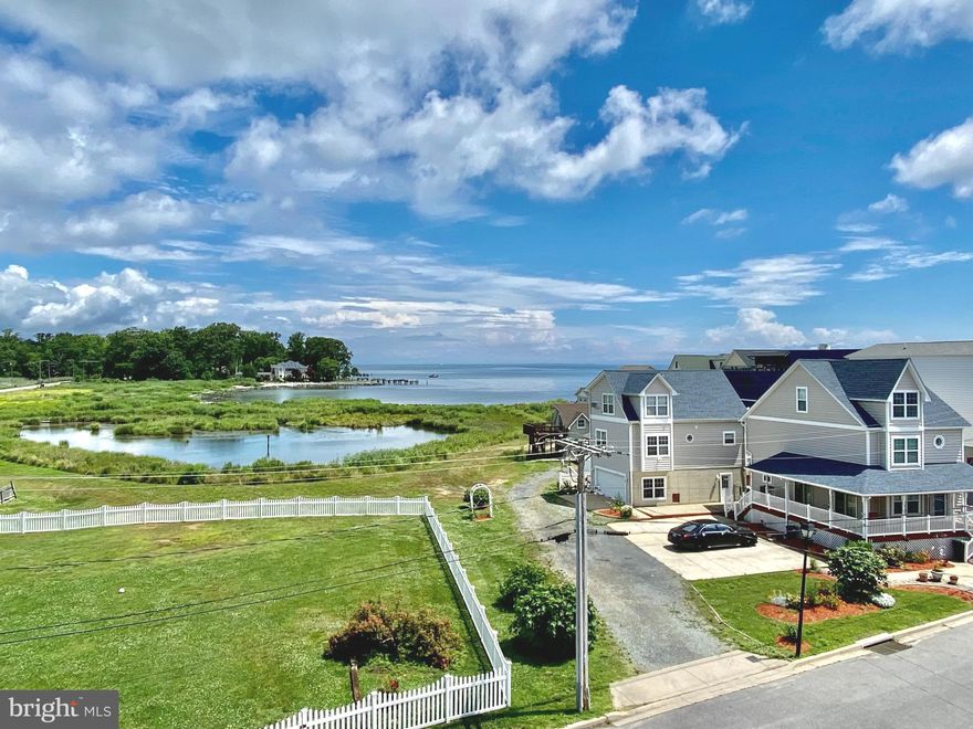 Amazing Bay views from every single room in this 4 story  Coastal home! Walls of windows & wrap around decks on  top 3 levels!  Find yourself in the center of Downtown North Beach with the boardwalk, sandy beach, and all the shops & restaurants right at your doorsteps! Open floor plan with 9 foot ceiling, modern kitchen & breakfast bar. 4th floor game room with full bed & bathroom! Dual zone HVAC. Take out your kayak or bike and explore  boardwalks coastal beaches & nature parks. Great place to call home & vacation all year round! Only 50 minutes from DC!