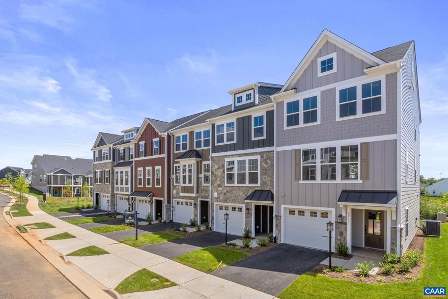 Located in a newly released section of Creekwood Village in Waynesboro, The Dahlia offers a well-balanced three-level layout with 2,095 finished square feet. This townhome includes four bedrooms, three and a half bathrooms, and an attached one-car garage. The entry level features a private bedroom and full bath, ideal for flexible living needs. On the main floor, an open-concept family room connects to a spacious kitchen with an island, pantry, and adjacent dining area, plus a half bath and optional deck. Upstairs, the primary suite includes a private bath and walk-in closet, while two additional bedrooms, a full bath, and laundry round out the top floor. The first homes in this section are estimated for completion in late summer. Creekwood Village offers low-maintenance living in a scenic Shenandoah Valley setting, with convenient access to nearby shopping, dining, and outdoor recreation. Photos shown are of a similar home and may include optional or upgraded features. Expected late Summer completion.,Granite Counter,Painted Cabinets,White Cabinets