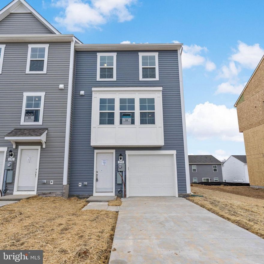This 3 level End unit townhome features a fully finished lower level with a bedroom, a full bath, 1 car garage, and large coat closet. On the main level, you'll find an open concept layout with 8 Ft. island upgraded cabinets, countertops and stainless-steel appliances. The large living room at the front of the home lets in loads of natural light through the windows. This level also includes a half bath. On the 3rd floor we have the primary bedroom which includes a private ensuite and walk in closet.  Two additional bedrooms, full bathroom, and laundry completes this third level.