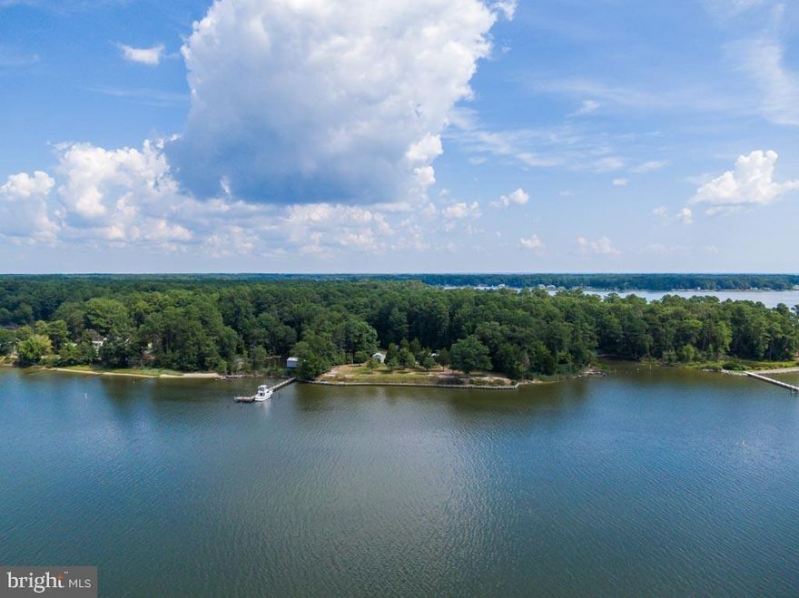 You are going to absolutely fall in love with this cozy cottage style home in Kinsale, Virginia! Boy does this home have so much to offer you! This property comes with two additional lots. 170 Allen Point Rd. sits on a 1.55 acre lot with 225 ft of shoreline. There is also a lot of 1.55 acres, and a 3rd lot that has already been surveyed for another potential homesite that is 1.77 acres. 150 ft dock is already installed and in perfect condition, low tide at the end of the dock is 6-8 ft. Brand new roof! Fire pit is ready in the backyard and matures trees don't obstruct the view but add some shade for your family get-togethers out back! Inside is just as great! You have beautiful wood floors in most rooms, the kitchen has Corian countertops, tons of cabinet space! Separate laundry room with storage space as well! Both bedrooms are spacious! The 3 seasons room is to die for with radiant heated tiles and a fireplace insert that heats the entire house. There is a screened in porch that you are sure to spend you mornings and evenings in! There are 2 sheds that convey. Driveway alarm, washer and dryer convey and there is attic storage between bedrooms. Great opportunity to build your dream home and use this property as a guest home or family retreat, maybe even rental income! This one really has it all! Schedule a visit today!