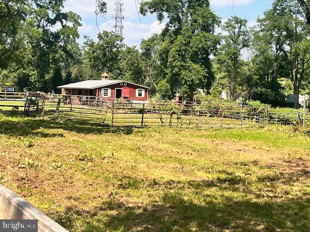 RESIDENCE IS NOT INCLUDED. Landlords live in the house on the property. Rental includes 6 stalls - 4 in barn (owner is enlarging) & 2 run-in sheds will have gates & serve as 2 additional stalls. Tack/grain area in barn. Hay shed to be built along side barn. Good-sized lighted outdoor riding arena with nice footing & 2 zone sprinkler system!! This ring looks to be well-built with ample drainage - new owners say it doesn't appear to have puddles after a lot of rain. Covered hay feeder in rear paddock could possibly hold a round bale. Round pen. Property goes far in back - good for hacking. Landlords will take care of mowing, weed whacking & driveway snow removal. Credit check & rental application. Credit score 650 or over.