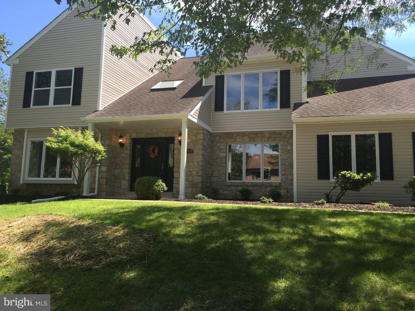 Amazing Colonial in sought after Estates of Doylestown. HUGE 4 Bed,2.5 Bath, 2 car garage on great lot with nearly 3400sqft of living space. Totally custom renovations, showered w/ natural light thru-out home. You are greeted with welcoming curb appeal, elegant stonework with handsome blk shutters, new maintenance free siding also entry door with side lights. Foyer features bamboo hardwood floor with custom shadow box wainscoting. Flowing easily into Living room features fresh neutral paint and recessed lighting, crown molding, and beautiful ledger stone gas fireplace and new carpet with large windows pouring in the light. Custom Kitchen featuring loads of Maple cabinets, with peninsula island and beatiful granite countertops with glass tile back-splash, Ceramic floor, stainless appliances Kitchen Aid Stove and Microwave, stainless sink...kitchen is wide open to the large famly room with new carpet, recessed lighting and fresh neutral painting. also, sliding doors leading to a large brick paver patio. Also on the main level is a powder room with granite vanity and large laundry area and large formal dining room with elegant chandelier, bamboo hardwood flooring and crown molding.  Upstairs are 4 very large bedrooms and a main bedroom with cathedral ceilings in the sitting area also including recessed lighting, new carpet and fresh paint and 2 large walk-in closets.  There is a door leading to a large refinished Deck with maintenance free composite deck boards and vynil railings, that over looks large wide open yard, great for the outdoor bbq's and BIG parties for entertaining.  Also Off of the main bedroom is a mastr bathroom retreat with ceramic tile shower w/ Glass deco's, large 5ft sink quartz vanity, cathedral ceilings and marble tub surround. There is a 2nd full bath with hardwood-look ceramic tile, tile shower with glass deco's and elegant 5ft granite vanity sink. Additional features for this great Home include, newer water heater, some new windows, 200amp elec panel/service, new 2car garage doors with windows. Everything is done for you, Come fall in love, Just Move in & relax. Wont Last!